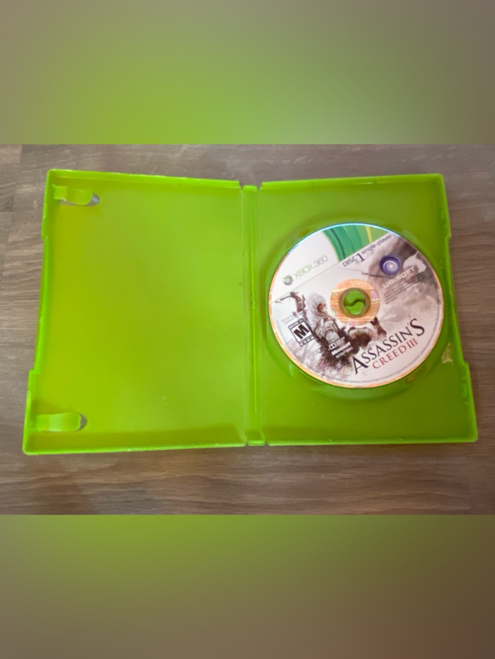 Assassin's Creed III Game Disc with Lime Green Case
💥 Tested 💥